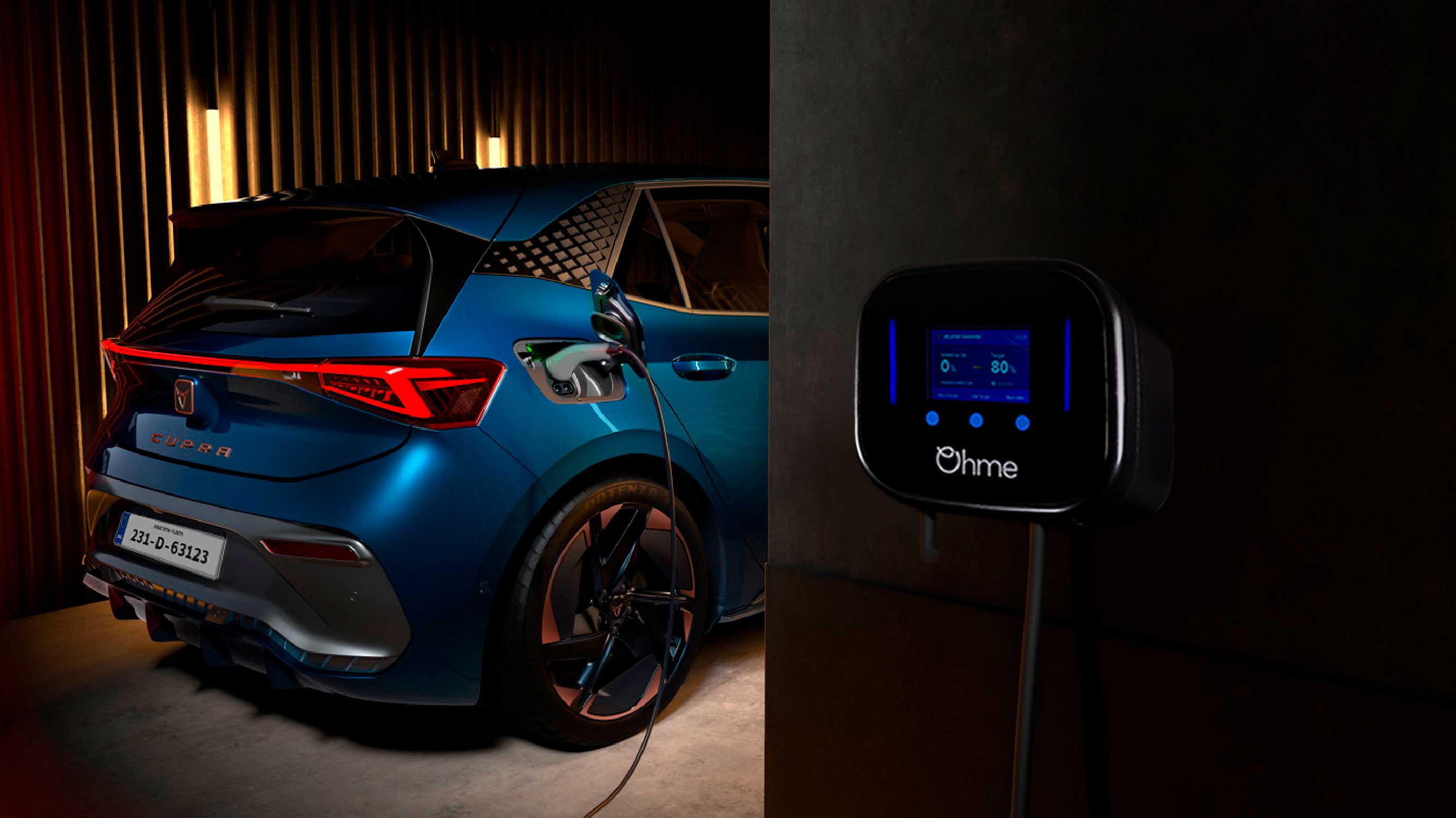 blue CUPRA Born car is charging using OHME home pro,  rear view