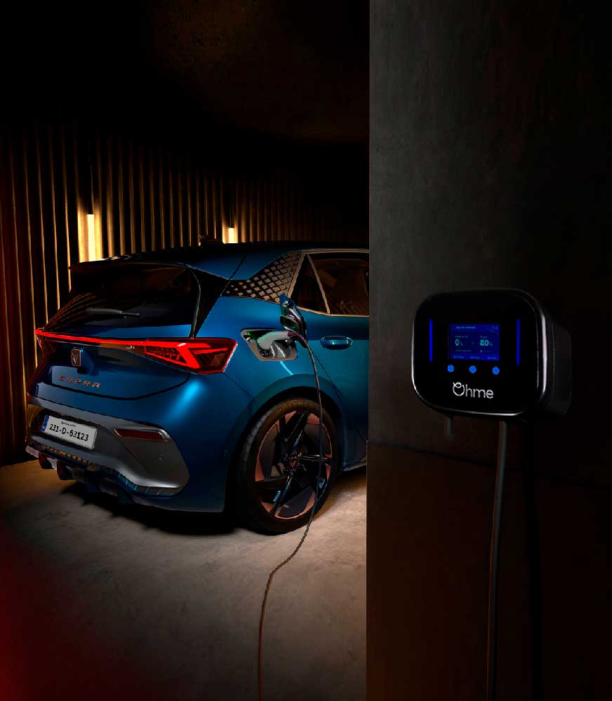 blue CUPRA Born car is charging using OHME home pro,  rear view
