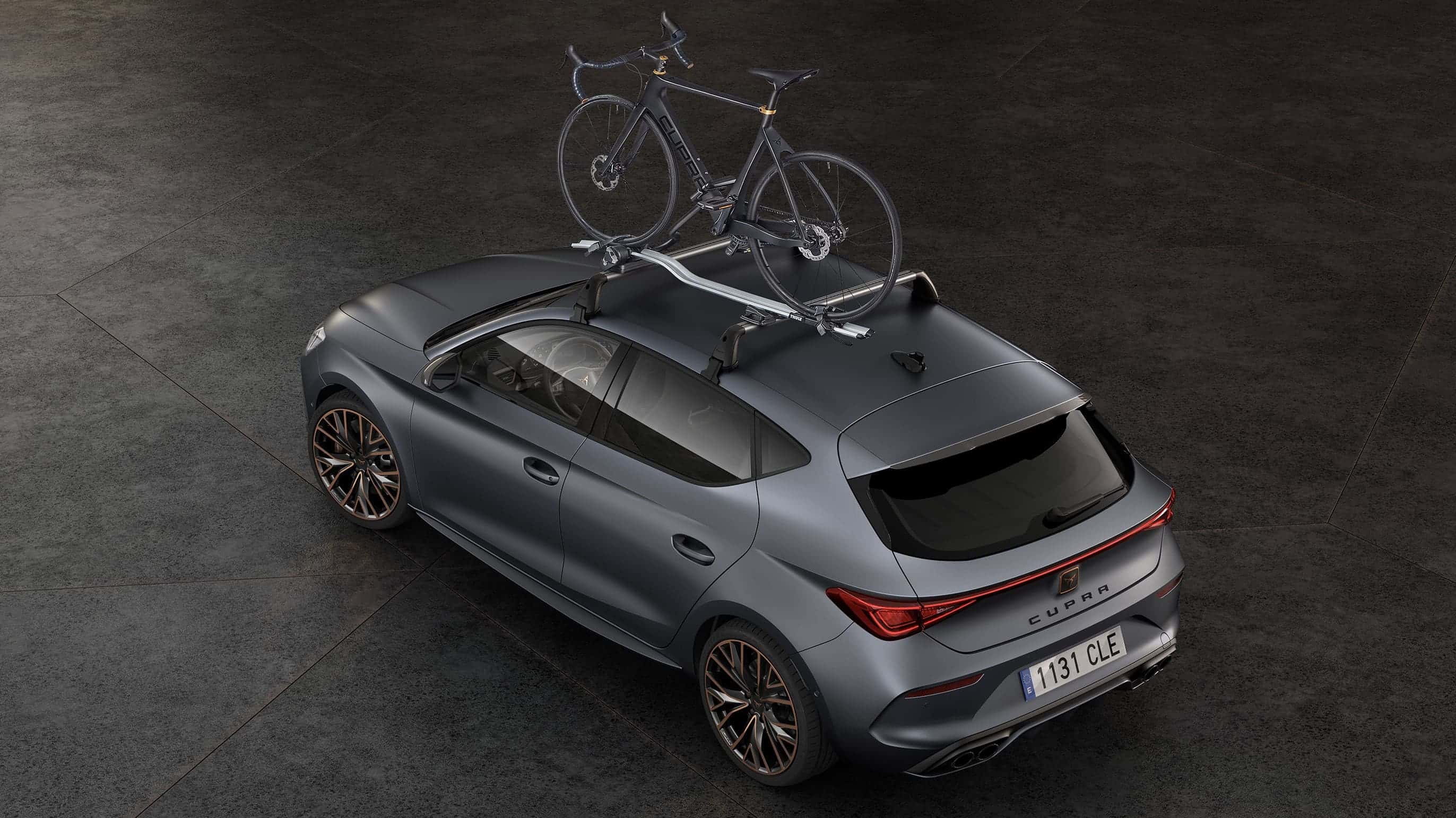 cupra leon 5d with a roof bike rack car accessory