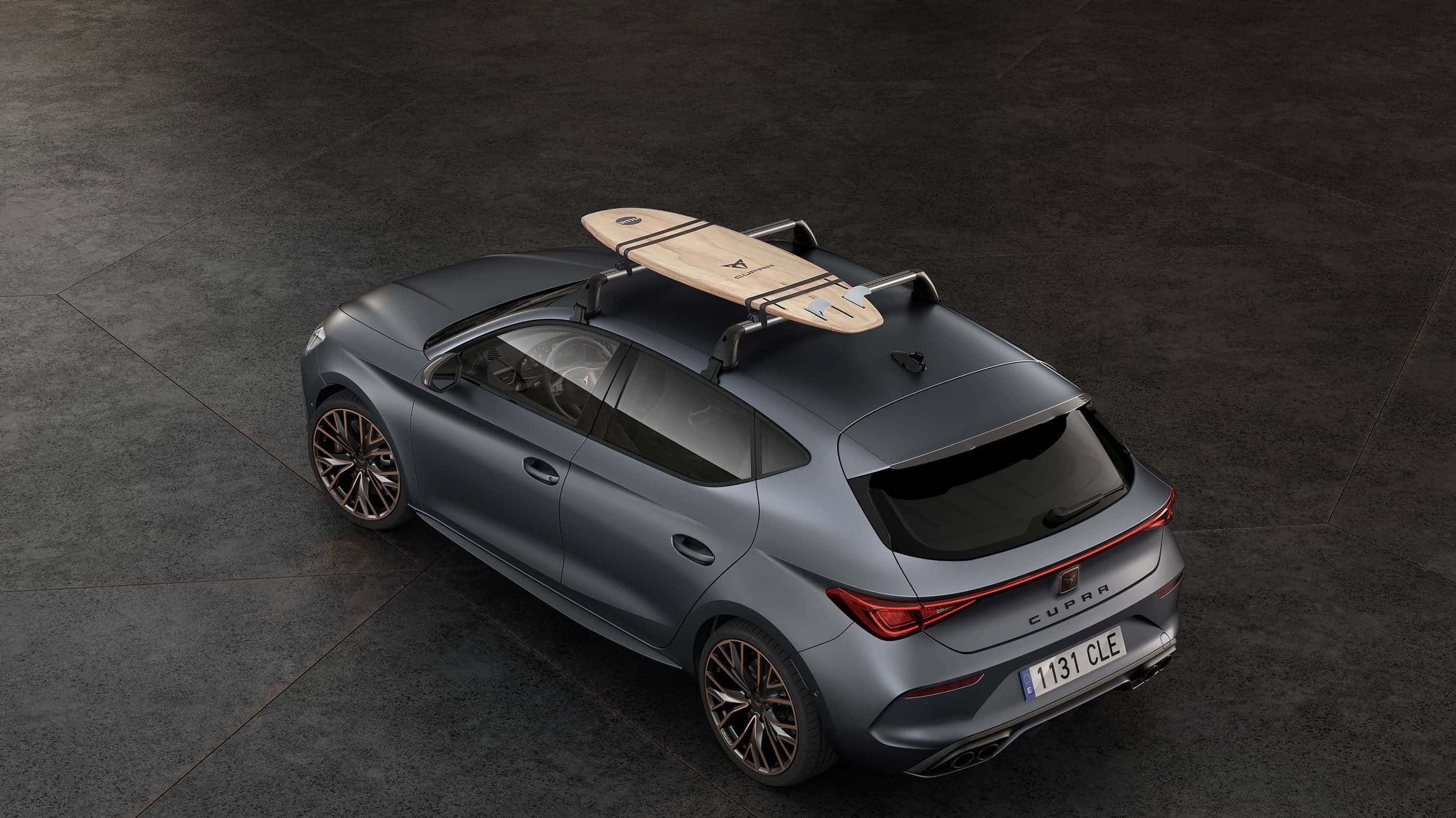 cupra leon 5d with a roof surf rack car accessory