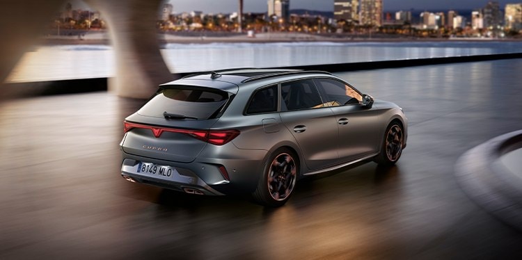 hire purchase electric vehicle and models in beige, highlighting flexibility through their poses, surrounding car.