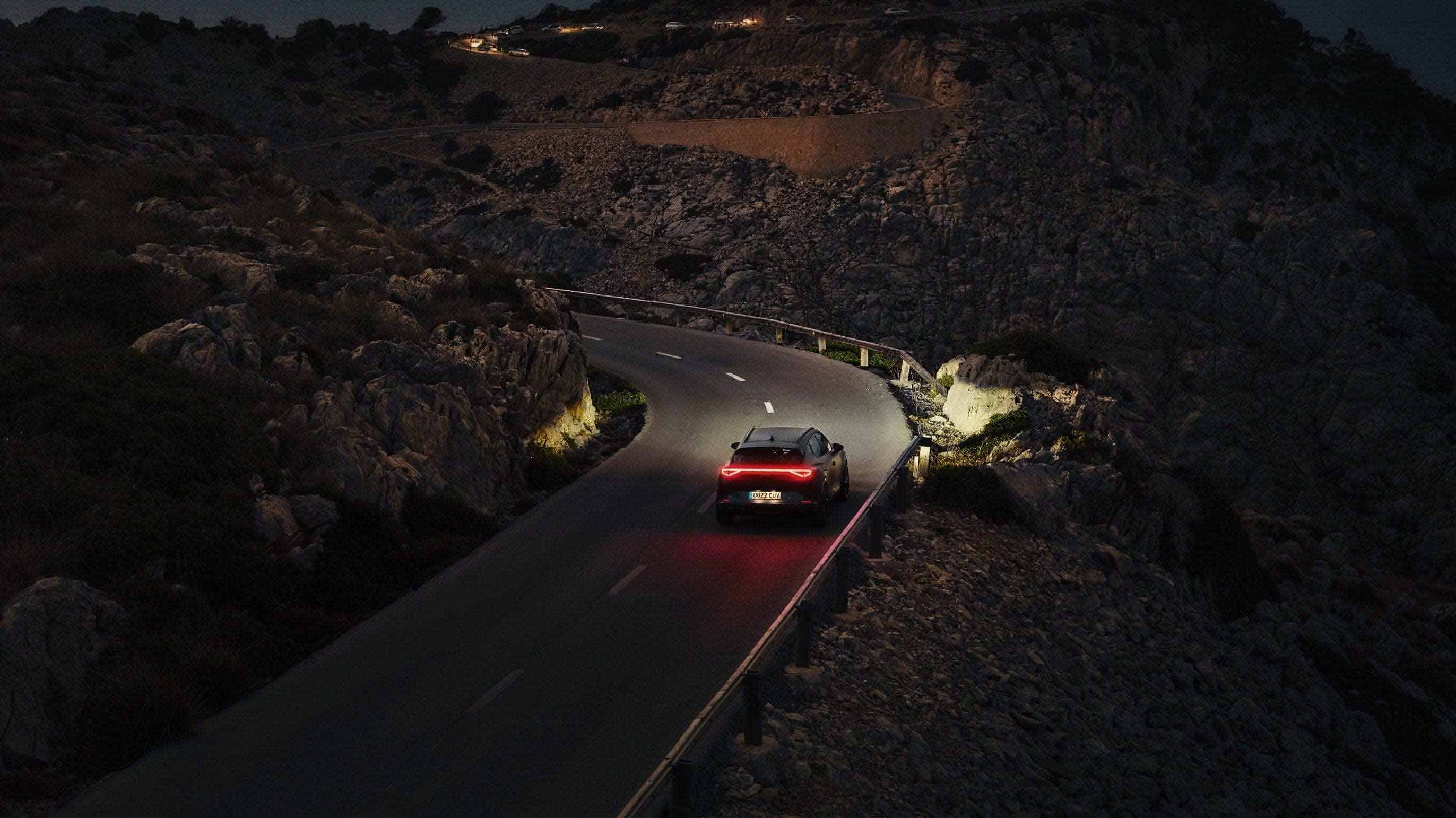 new CUPRA Formentor e-hybrid with rear coast lights on the road 