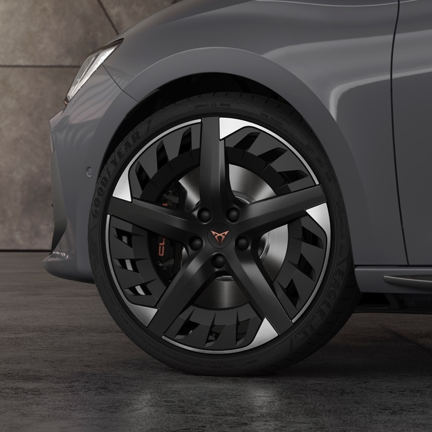 new CUPRA Leon five doors ehybrid Compact Sports Car with 19” Machined Alloy wheels in Black and Silver. Close view.