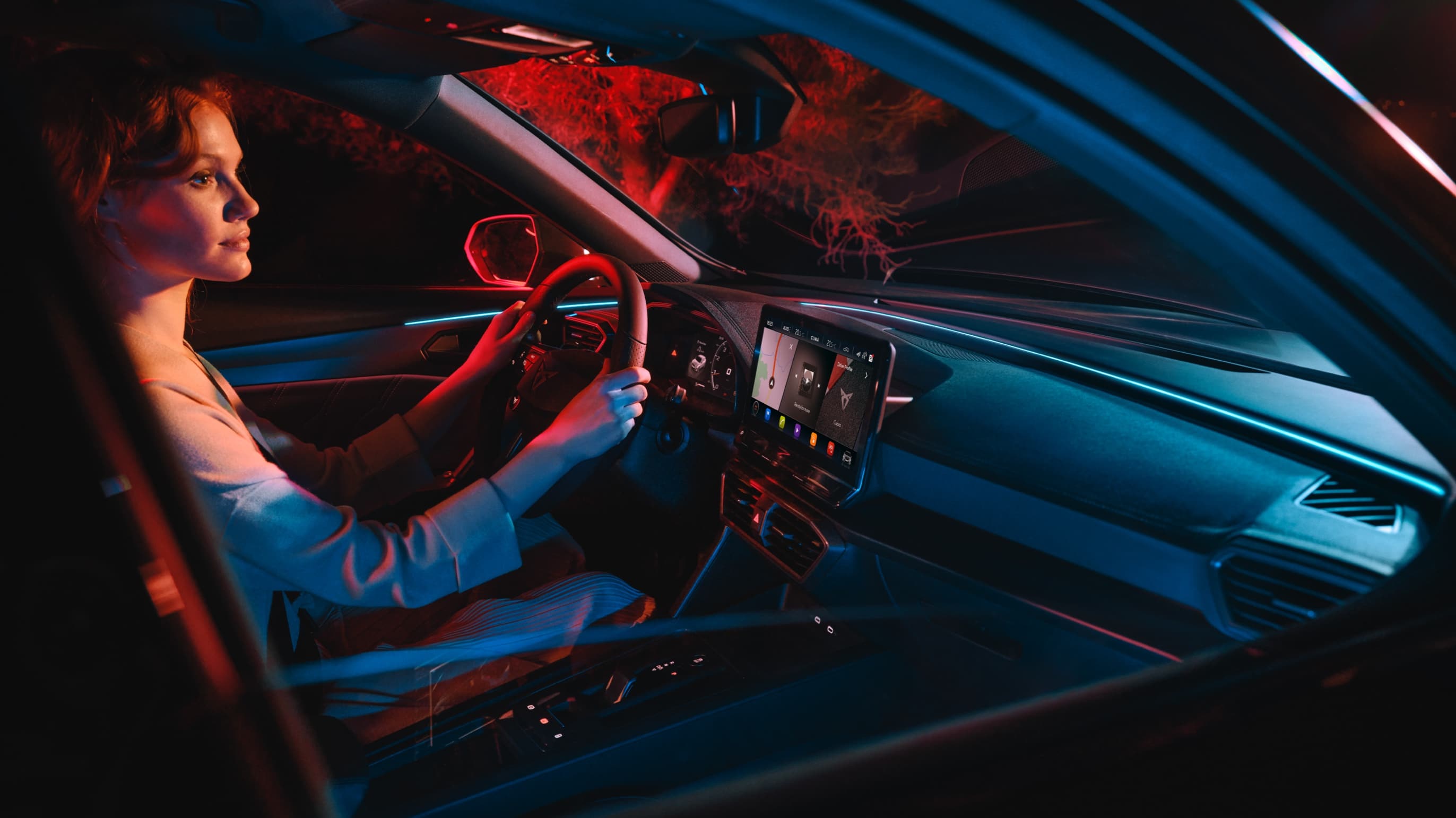 woman inside the new cupra formentor with led lighting 