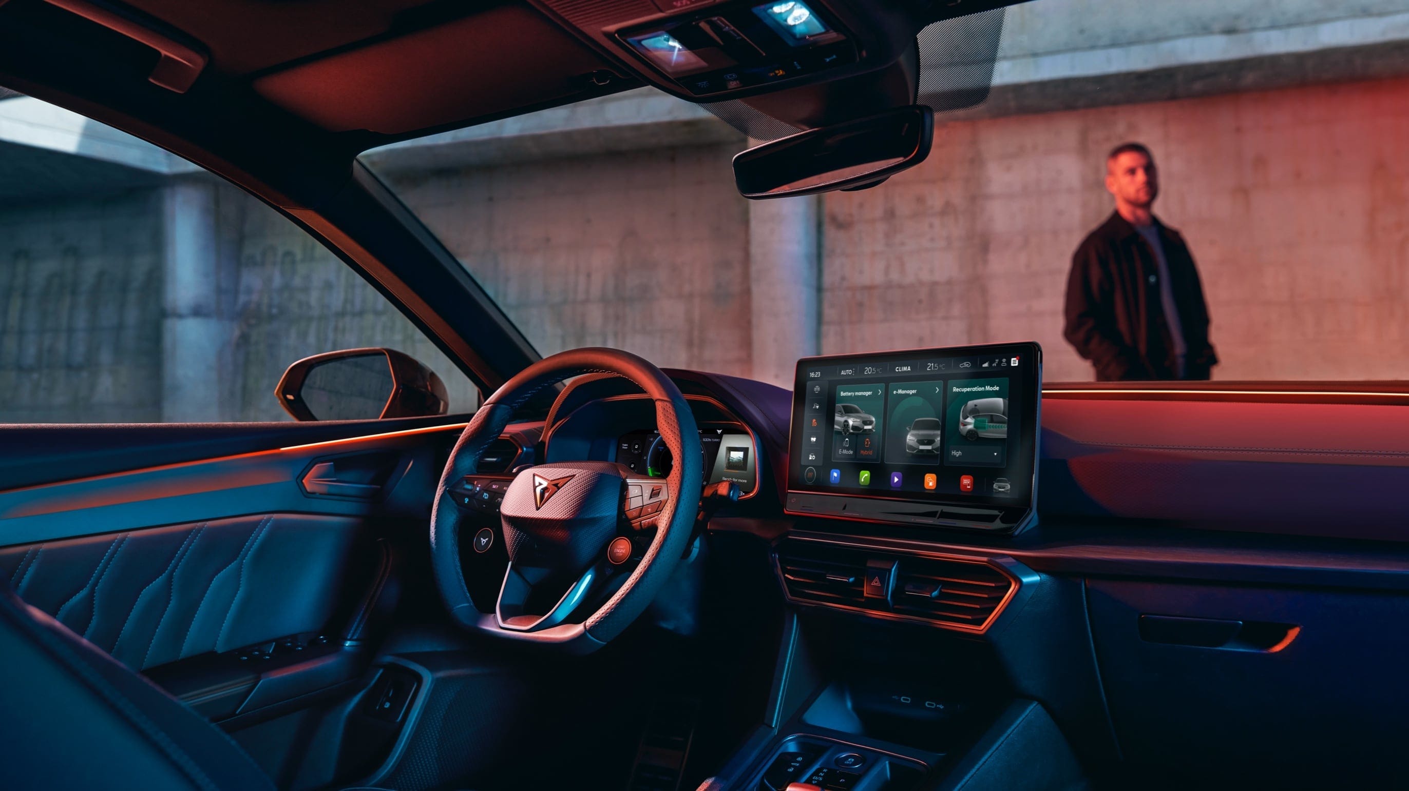 new CUPRA Leon 5 door ehybrid compact sports car interior view of dashboard with leather steering wheel in leather