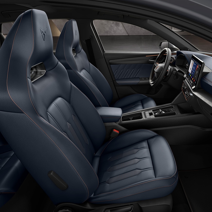 new CUPRA Leon 5 door ehybrid compact sports car bucket seats, door panel and central console in genuine petrol blue leather