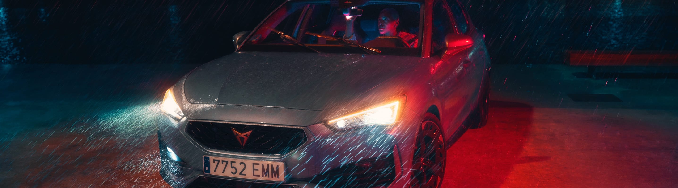Man leaning on CUPRA Formentor front grill